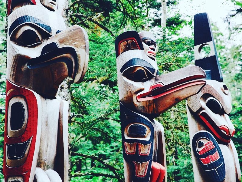 totem poles in kitselas canyon british columbia